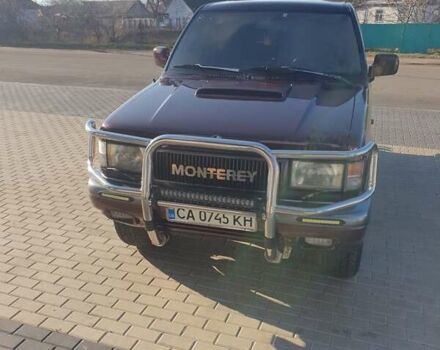 Червоний Опель Монтерей, об'ємом двигуна 3.1 л та пробігом 250 тис. км за 9000 $, фото 10 на Automoto.ua