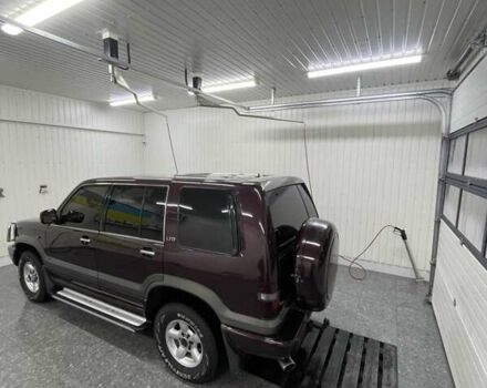 Красный Опель Монтерей, объемом двигателя 3.1 л и пробегом 250 тыс. км за 9000 $, фото 1 на Automoto.ua