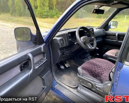 Синий Опель Монтерей, объемом двигателя 3.1 л и пробегом 245 тыс. км за 4950 $, фото 10 на Automoto.ua