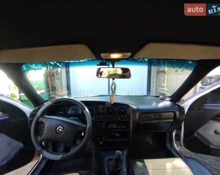 Білий Опель Омега, об'ємом двигуна 2 л та пробігом 325 тис. км за 2000 $, фото 7 на Automoto.ua