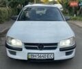 Білий Опель Омега, об'ємом двигуна 2 л та пробігом 200 тис. км за 1900 $, фото 4 на Automoto.ua