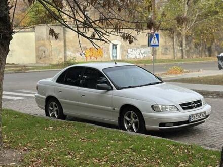 Белый Опель Омега, объемом двигателя 2.5 л и пробегом 285 тыс. км за 2700 $, фото 1 на Automoto.ua