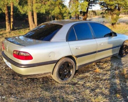 Бежевий Опель Омега, об'ємом двигуна 2 л та пробігом 362 тис. км за 2450 $, фото 5 на Automoto.ua