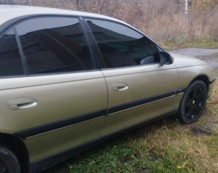 Бежевий Опель Омега, об'ємом двигуна 2 л та пробігом 362 тис. км за 2450 $, фото 12 на Automoto.ua