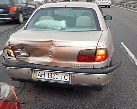 Бежевый Опель Омега, объемом двигателя 2 л и пробегом 302 тыс. км за 1500 $, фото 3 на Automoto.ua