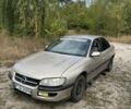 Бежевий Опель Омега, об'ємом двигуна 2.5 л та пробігом 258 тис. км за 999 $, фото 1 на Automoto.ua