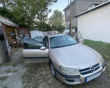 Бежевий Опель Омега, об'ємом двигуна 2 л та пробігом 395 тис. км за 2301 $, фото 1 на Automoto.ua