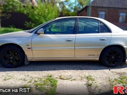 Бежевий Опель Омега, об'ємом двигуна 2 л та пробігом 450 тис. км за 3100 $, фото 1 на Automoto.ua