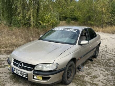 Бежевий Опель Омега, об'ємом двигуна 2.5 л та пробігом 258 тис. км за 999 $, фото 1 на Automoto.ua
