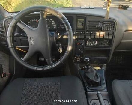 Чорний Опель Омега, об'ємом двигуна 2 л та пробігом 225 тис. км за 920 $, фото 13 на Automoto.ua