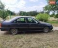 Черный Опель Омега, объемом двигателя 2 л и пробегом 395 тыс. км за 800 $, фото 1 на Automoto.ua