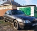 Черный Опель Омега, объемом двигателя 2.4 л и пробегом 200 тыс. км за 1800 $, фото 1 на Automoto.ua