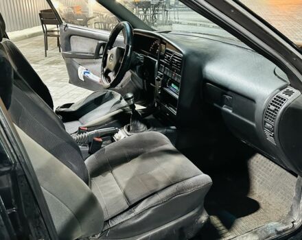 Черный Опель Омега, объемом двигателя 2 л и пробегом 290 тыс. км за 746 $, фото 12 на Automoto.ua