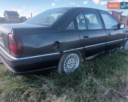 Черный Опель Омега, объемом двигателя 2.6 л и пробегом 250 тыс. км за 471 $, фото 2 на Automoto.ua