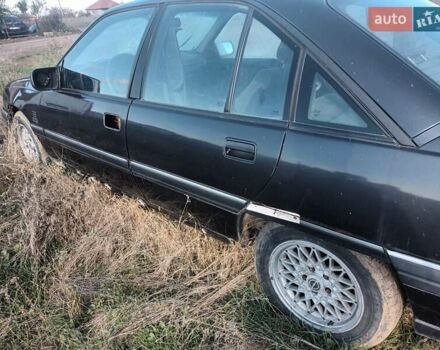 Черный Опель Омега, объемом двигателя 2.6 л и пробегом 250 тыс. км за 471 $, фото 4 на Automoto.ua