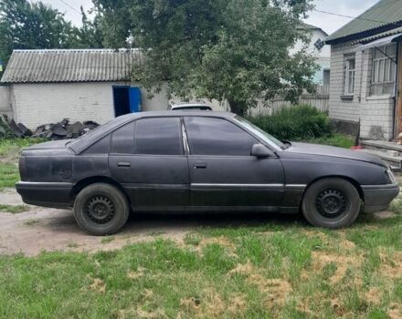Чорний Опель Омега, об'ємом двигуна 2.4 л та пробігом 370 тис. км за 558 $, фото 3 на Automoto.ua