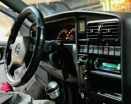 Черный Опель Омега, объемом двигателя 2 л и пробегом 290 тыс. км за 746 $, фото 13 на Automoto.ua