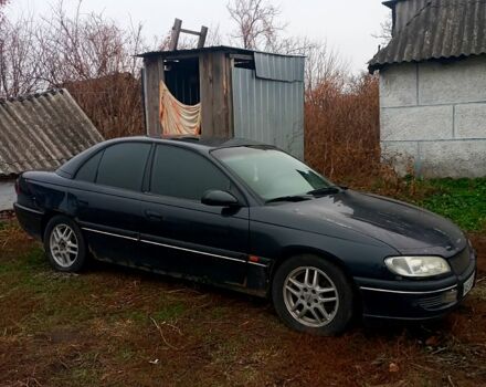 Черный Опель Омега, объемом двигателя 2.5 л и пробегом 330 тыс. км за 1300 $, фото 2 на Automoto.ua