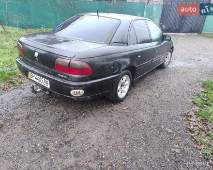Чорний Опель Омега, об'ємом двигуна 2.5 л та пробігом 350 тис. км за 1650 $, фото 5 на Automoto.ua