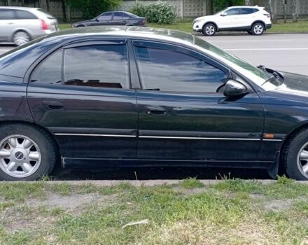 Черный Опель Омега, объемом двигателя 2.5 л и пробегом 311 тыс. км за 2299 $, фото 3 на Automoto.ua