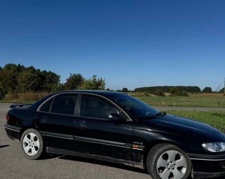 Черный Опель Омега, объемом двигателя 2.5 л и пробегом 470 тыс. км за 2400 $, фото 4 на Automoto.ua