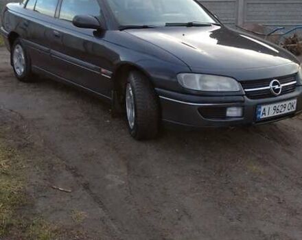 Черный Опель Омега, объемом двигателя 2.5 л и пробегом 300 тыс. км за 2900 $, фото 8 на Automoto.ua
