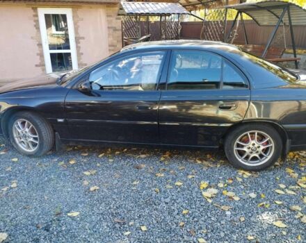 Чорний Опель Омега, об'ємом двигуна 3 л та пробігом 389 тис. км за 2500 $, фото 4 на Automoto.ua