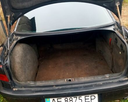 Черный Опель Омега, объемом двигателя 2.5 л и пробегом 330 тыс. км за 1300 $, фото 5 на Automoto.ua