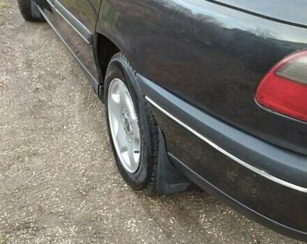 Черный Опель Омега, объемом двигателя 2.5 л и пробегом 300 тыс. км за 2900 $, фото 2 на Automoto.ua