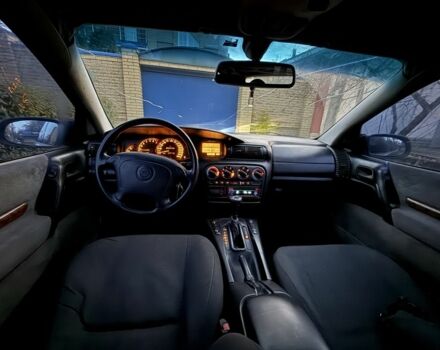 Черный Опель Омега, объемом двигателя 2.5 л и пробегом 365 тыс. км за 2200 $, фото 7 на Automoto.ua