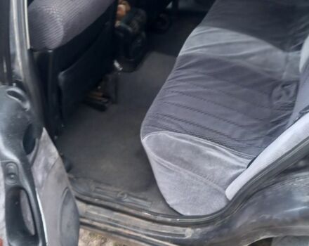 Чорний Опель Омега, об'ємом двигуна 2.5 л та пробігом 338 тис. км за 1800 $, фото 4 на Automoto.ua