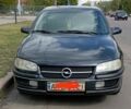 Черный Опель Омега, объемом двигателя 2.5 л и пробегом 311 тыс. км за 2299 $, фото 1 на Automoto.ua