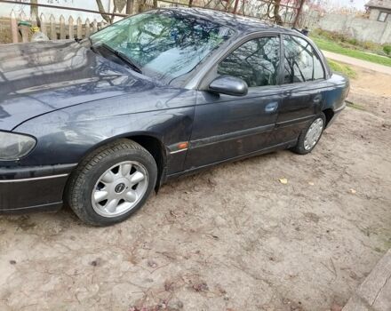 Черный Опель Омега, объемом двигателя 2.5 л и пробегом 361 тыс. км за 1200 $, фото 1 на Automoto.ua