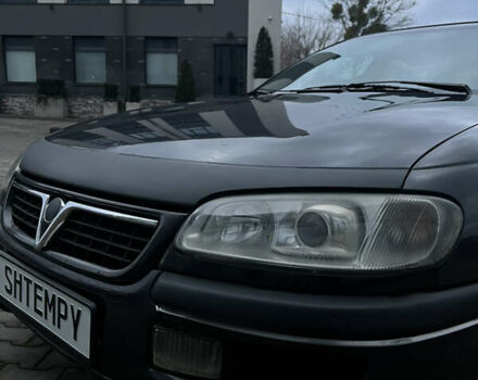 Черный Опель Омега, объемом двигателя 2.5 л и пробегом 300 тыс. км за 2200 $, фото 5 на Automoto.ua