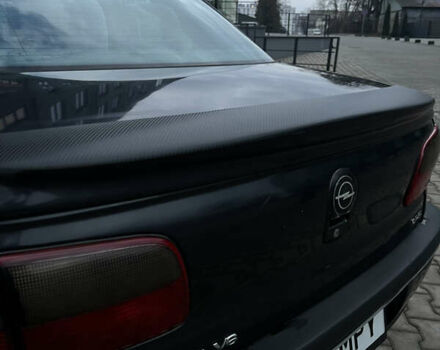 Черный Опель Омега, объемом двигателя 2.5 л и пробегом 300 тыс. км за 2200 $, фото 11 на Automoto.ua