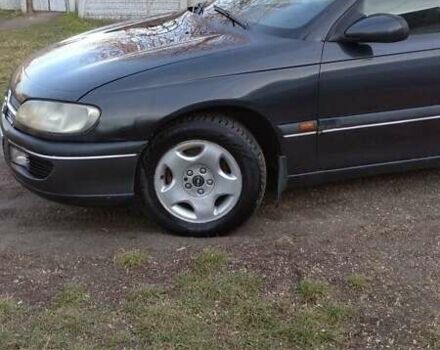 Черный Опель Омега, объемом двигателя 2.5 л и пробегом 300 тыс. км за 2900 $, фото 1 на Automoto.ua