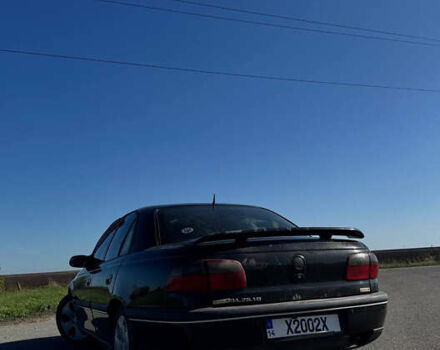 Черный Опель Омега, объемом двигателя 2.5 л и пробегом 470 тыс. км за 2400 $, фото 3 на Automoto.ua
