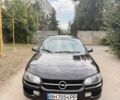 Черный Опель Омега, объемом двигателя 2 л и пробегом 250 тыс. км за 2500 $, фото 1 на Automoto.ua