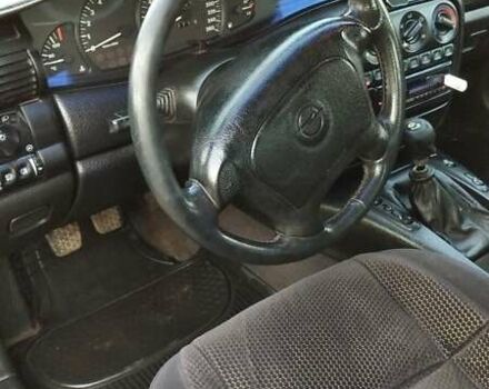 Черный Опель Омега, объемом двигателя 2.5 л и пробегом 300 тыс. км за 2900 $, фото 16 на Automoto.ua