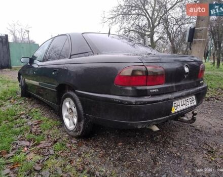 Чорний Опель Омега, об'ємом двигуна 2.5 л та пробігом 350 тис. км за 1650 $, фото 6 на Automoto.ua