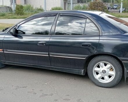 Черный Опель Омега, объемом двигателя 2.5 л и пробегом 311 тыс. км за 2299 $, фото 2 на Automoto.ua