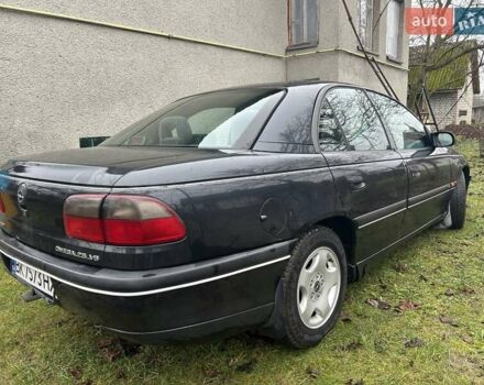 Черный Опель Омега, объемом двигателя 2.5 л и пробегом 274 тыс. км за 2000 $, фото 3 на Automoto.ua
