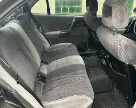 Черный Опель Омега, объемом двигателя 2.5 л и пробегом 274 тыс. км за 2000 $, фото 11 на Automoto.ua