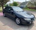 Черный Опель Омега, объемом двигателя 2.5 л и пробегом 400 тыс. км за 1600 $, фото 1 на Automoto.ua