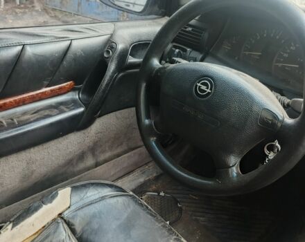 Черный Опель Омега, объемом двигателя 2 л и пробегом 370 тыс. км за 850 $, фото 7 на Automoto.ua
