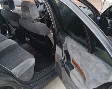 Черный Опель Омега, объемом двигателя 2.5 л и пробегом 328 тыс. км за 3000 $, фото 9 на Automoto.ua