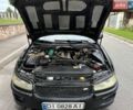 Чорний Опель Омега, об'ємом двигуна 2 л та пробігом 390 тис. км за 1999 $, фото 22 на Automoto.ua