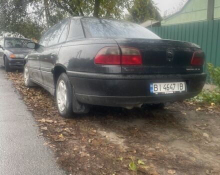 Черный Опель Омега, объемом двигателя 2.5 л и пробегом 378 тыс. км за 1500 $, фото 3 на Automoto.ua