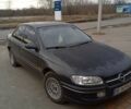 Черный Опель Омега, объемом двигателя 2.5 л и пробегом 328 тыс. км за 3000 $, фото 1 на Automoto.ua