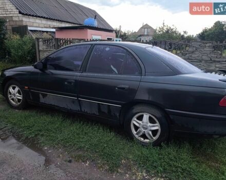 Черный Опель Омега, объемом двигателя 2.5 л и пробегом 500 тыс. км за 800 $, фото 2 на Automoto.ua